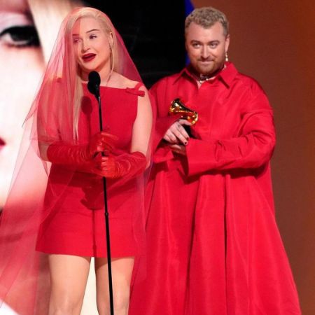 Kim Petras and Sam Smith were accepting their Grammy Awards wearing matching red outfits.